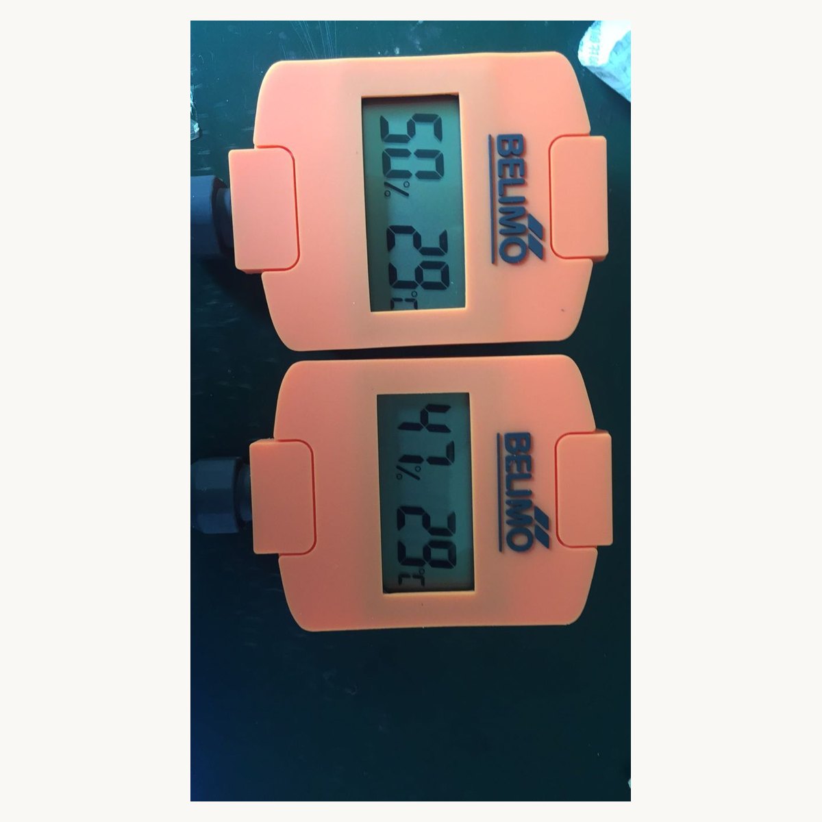 Pink soft PVC figure moulded as a calculator, shown front and back