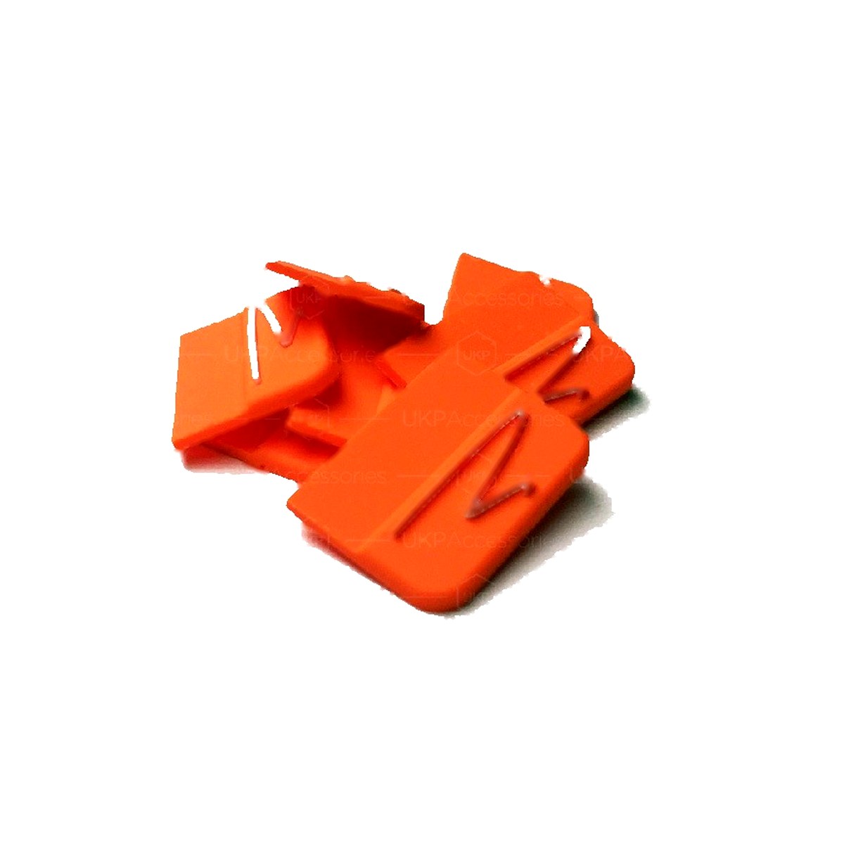 Orange injection-moulded soft PVC seam tabs with a moulded sewing channel, shown in a pile