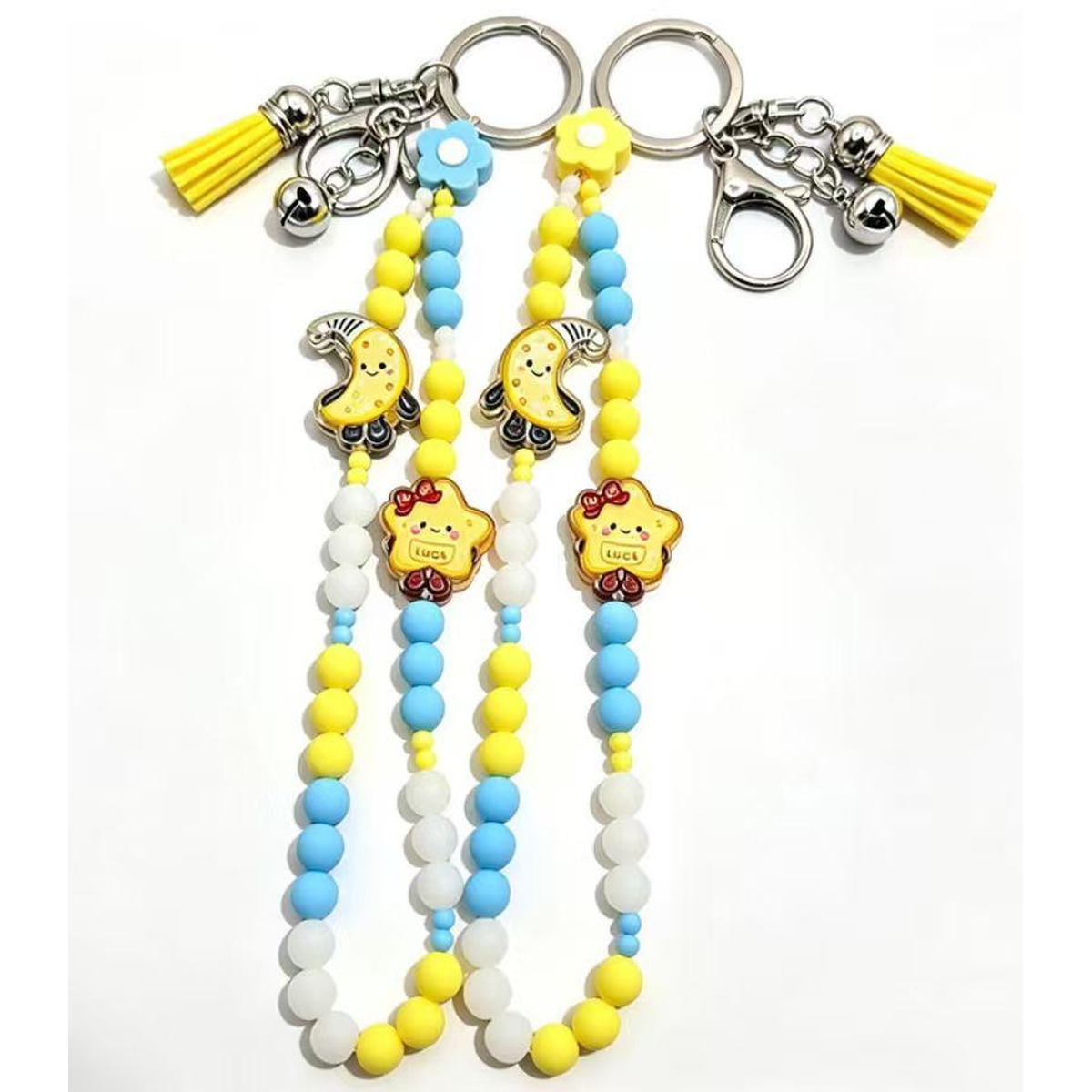 Damper bead charm worn as a bracelet, close view of the moulded silicone beads
